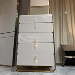 High-Gloss Cream Tall Sideboard Cabinet with Five Rounded Drawers Gold-Tone Stainless Steel Frame and Ribbed Side Panels